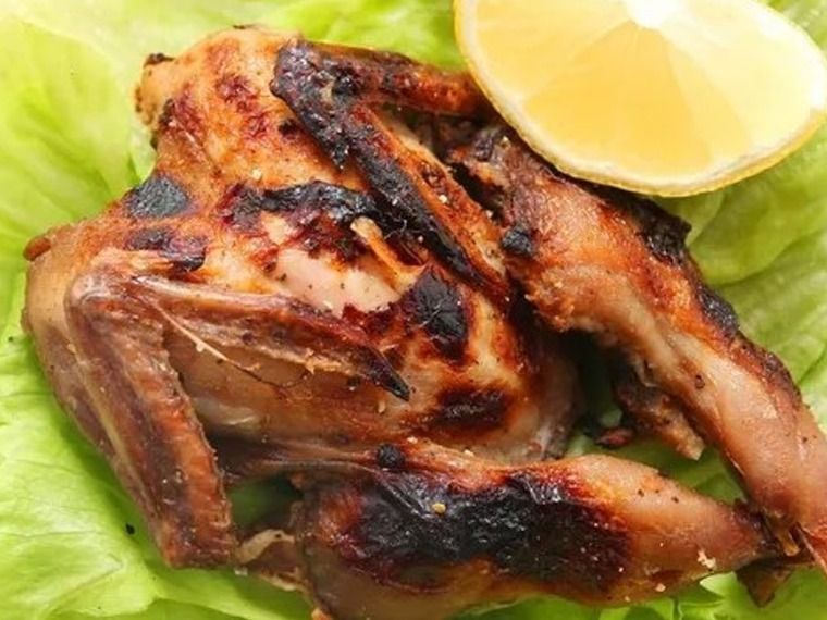 Charcoal grilled pigeon