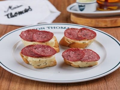 Garlic bread with salami