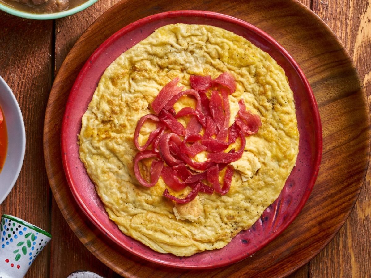 Omelette eggs with pastrami plate