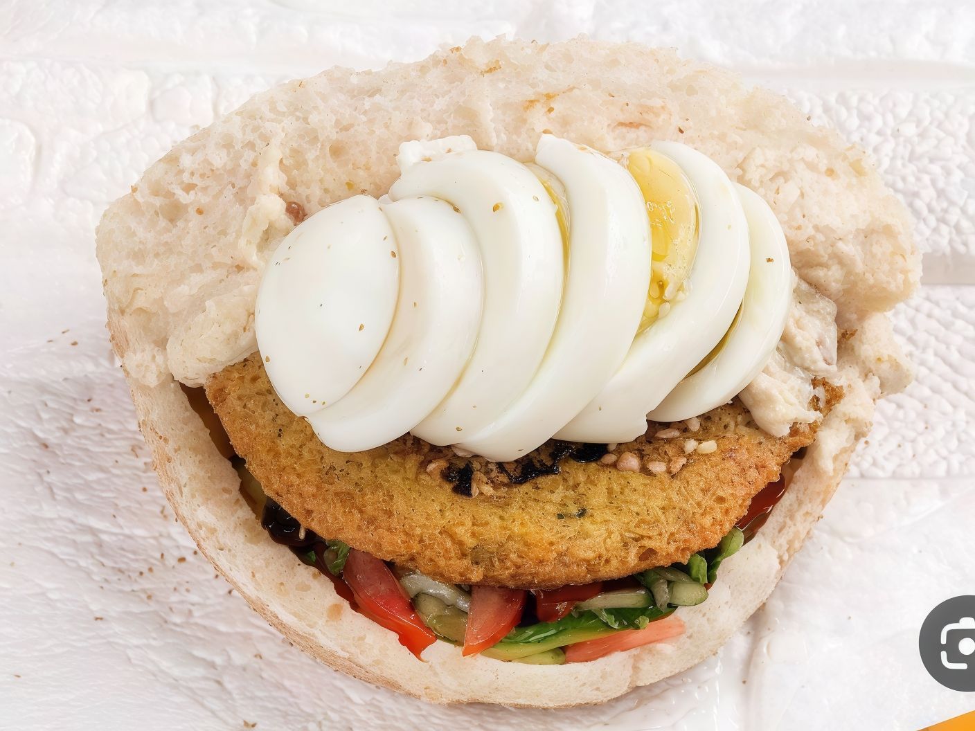Falafel sandwich with boiled egg