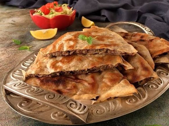 Mixed cheese hawawshi