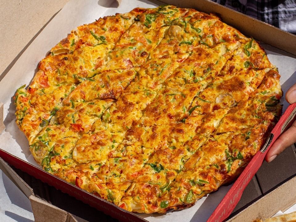 Oriental Sausage and Pastrami Pizza