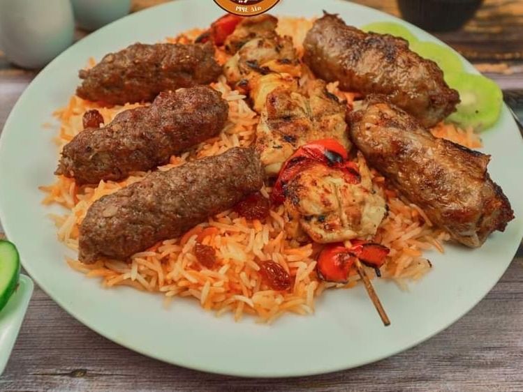 Anous Mixed Grill Meal: 1/8 Kofta, 1/8 Shish Tawook, 1/8 Tarab, with Rice
