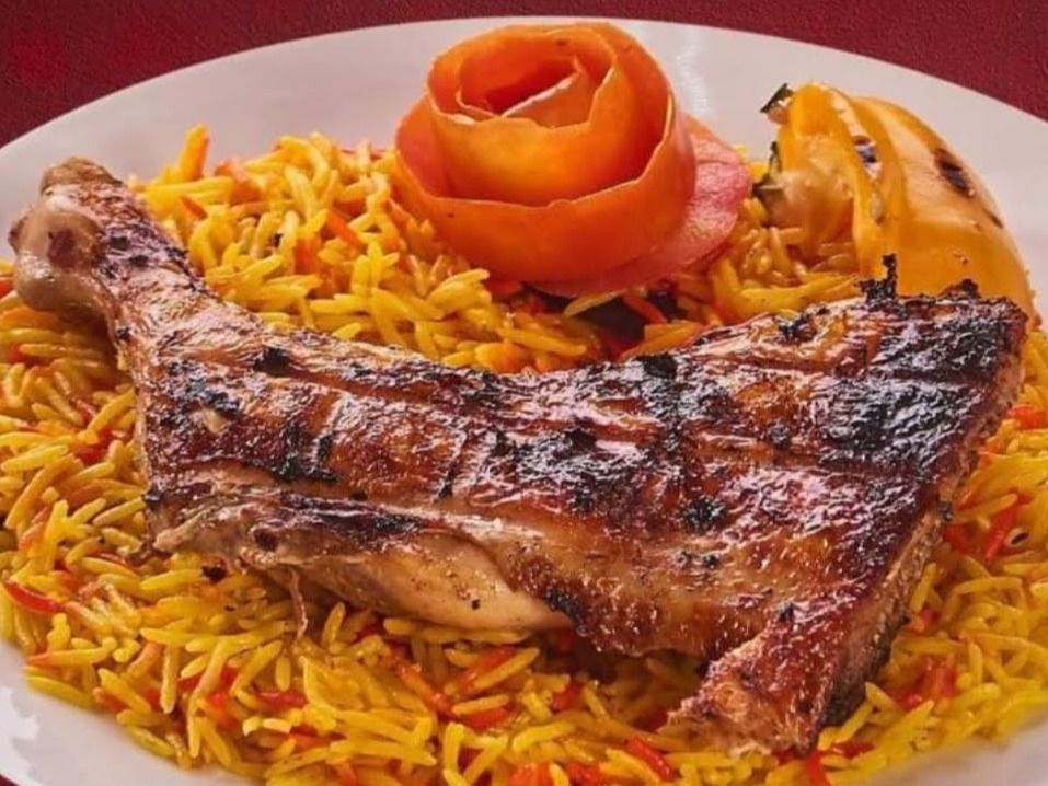 Quarter chicken thigh with rice + vegetables of the day