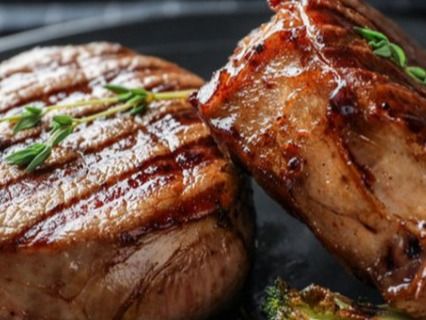 Cleo steak on charcoal for my meat