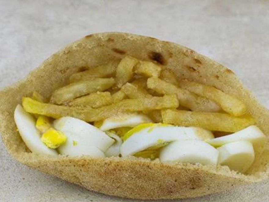 French Fries with Boiled Eggs And Spices Sandwich