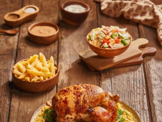 Grilled chicken with rice and potatoes