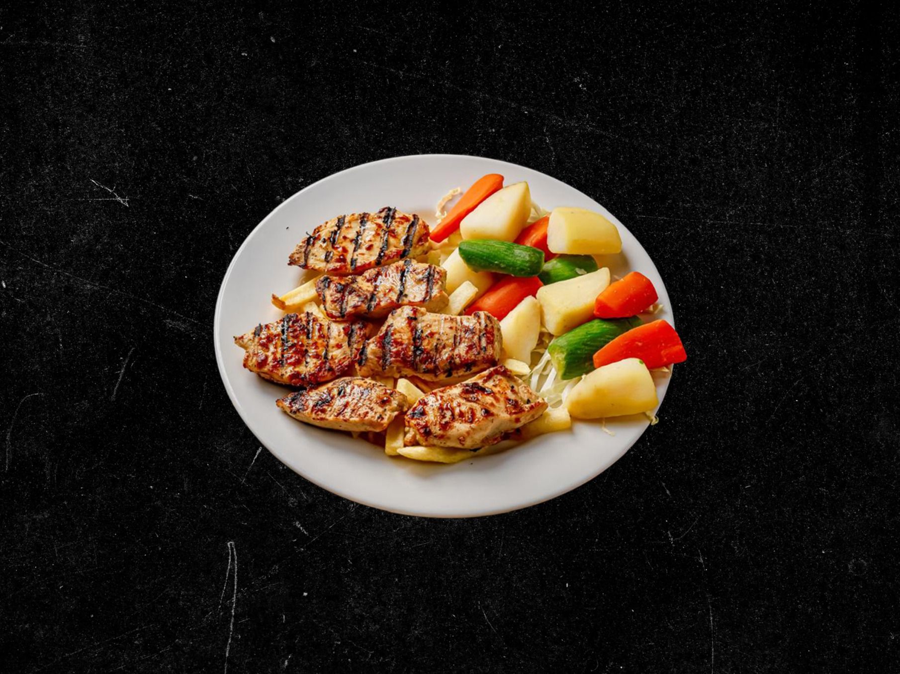 Grilled pane with sauteed vegetables dish