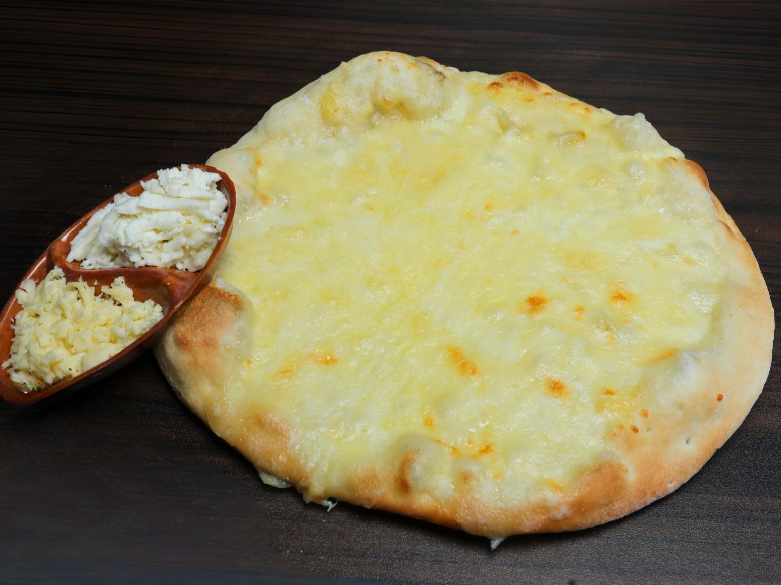 Manousheh with Akawi and Kashkaval Cheese