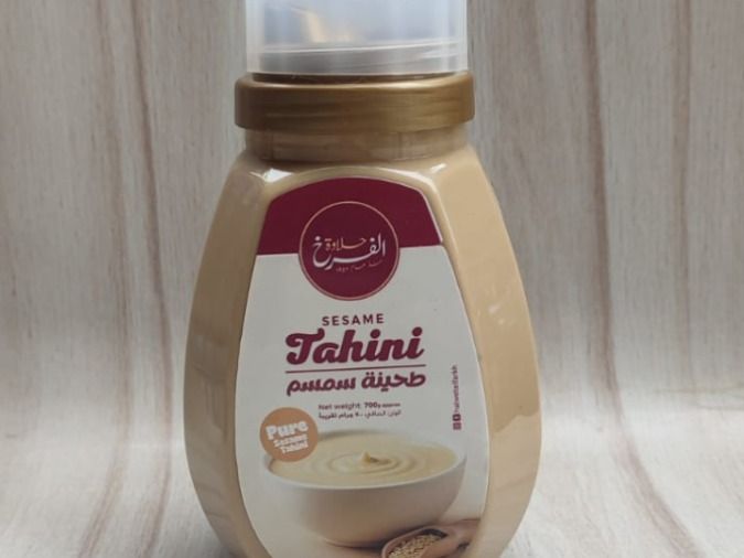 A large jar of Tahini