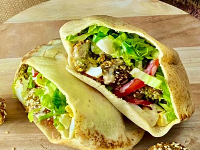 Foul with falafel and butter sandwich