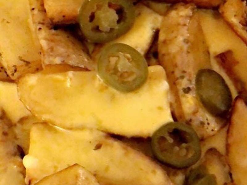 French Fries And Cheddar Cheese Sauce