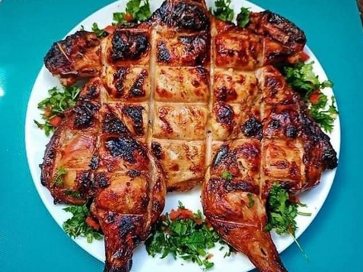 Whole Grilled Chicken On Charcoal