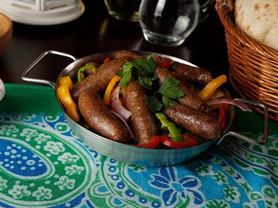 Pan of grilled sausage