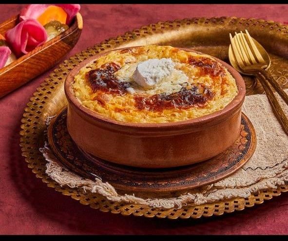 Me3amar Rice Tagen With Qeshta Cream