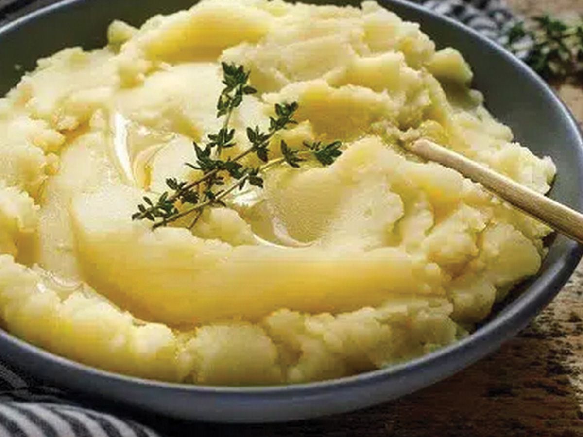 Box of mashed boiled eggs with butter
