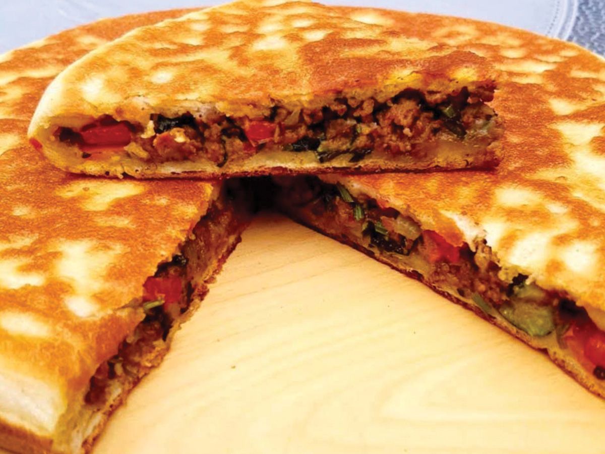 Feteer with sausage and Kiri cheese filling