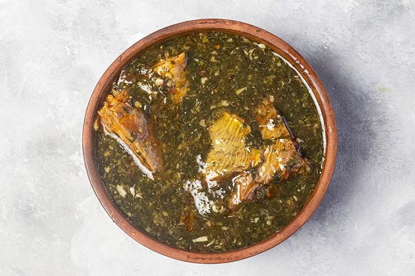 Tajin Molokhia with Meat and Rice
