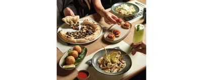 على الحطب بيتزيريا photo 1